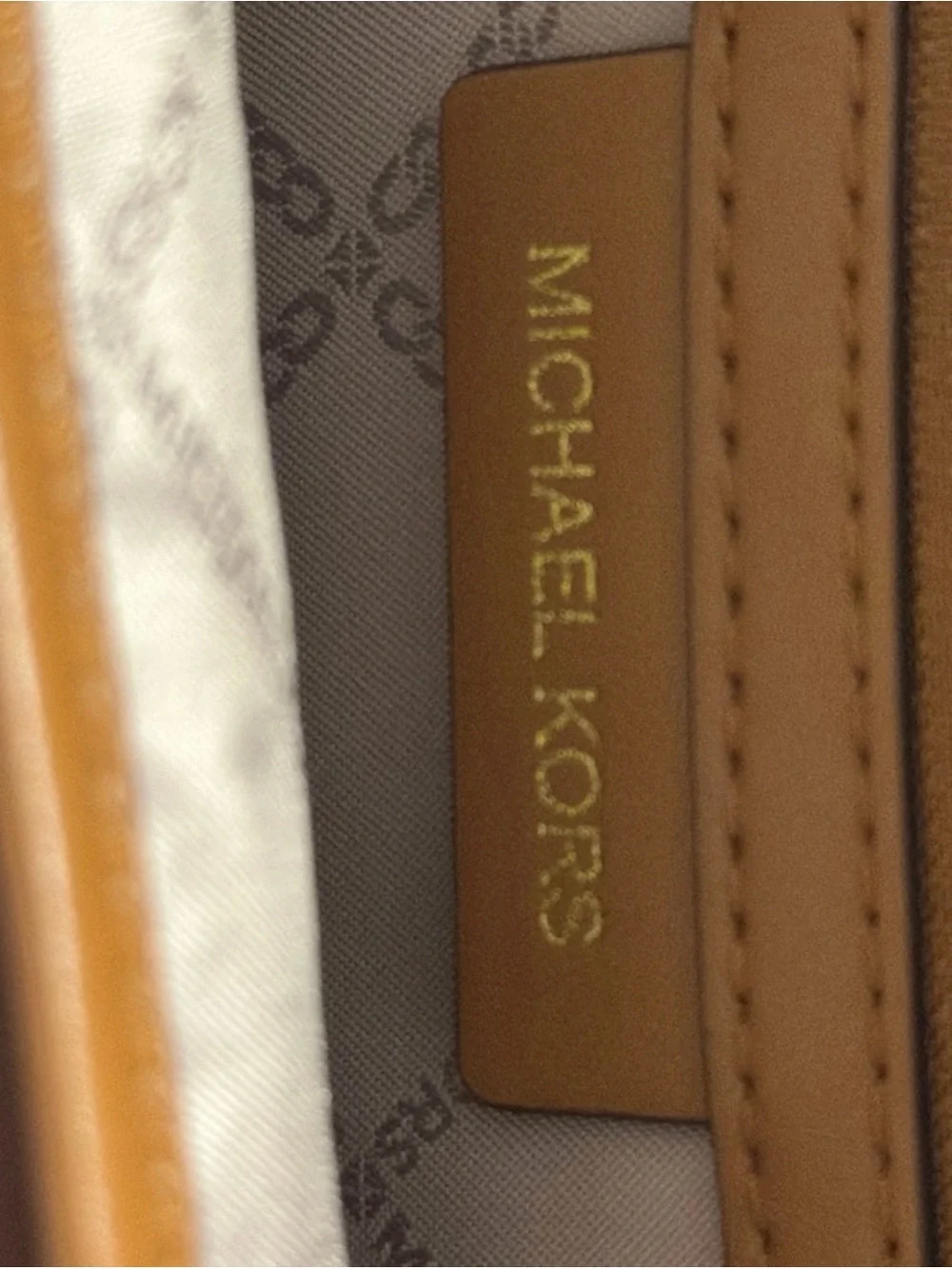 Michael Kors Brown Monogram Backpack with Tan Trim and Gold Hardware